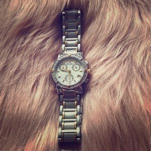 Bulova Women’s Watch with small diamonds.